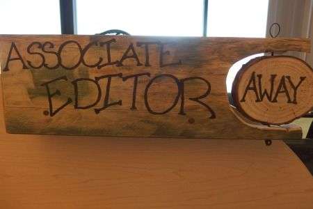 associate editor sign