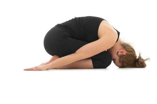 woman doing childs pose