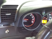 scramble boost button on the left. methanol power button/indicator to the right, in between my tachometer and speedometer (hope its spelled right)