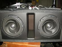 kenwood, good sound i have to dynomat my trunk tho(after i fix my leak)