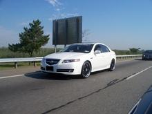 on the high way going to a car show