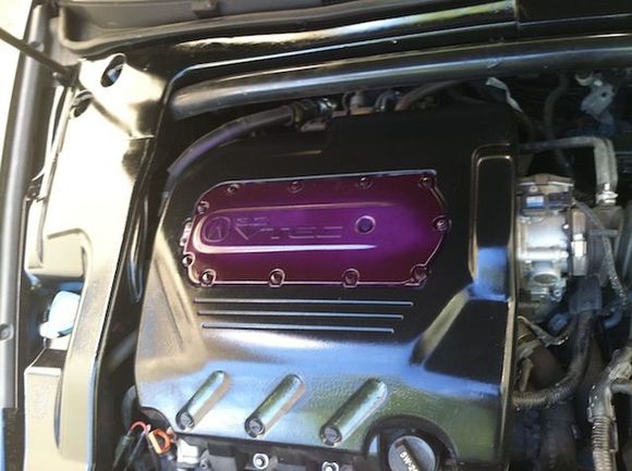 Just Painted my engine Cover Black N the metal part Purple with pink cloud in the middle (August 22 2011)