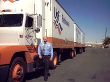 Here I am next to my &quot;large car&quot;. How many truck drivers do YOU know who wear a tie? 