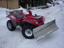 Stainless plow i made at work.  Works nice as all the snow slides off real easy.