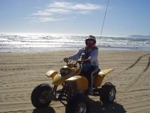 My Wife Trena giving the dog a ride on her honda 400ex down Pismo beach                                                                                                                                 