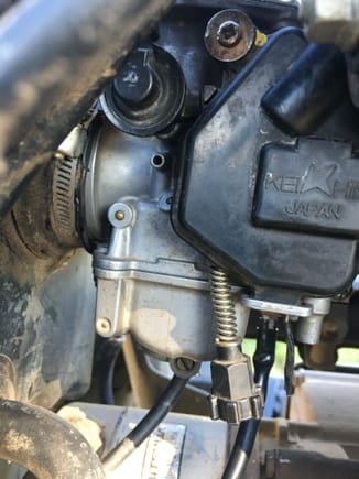 I think i captured the mixture screw, and the throttle knob.  Where does the vacuum/vent? orifice connect to?  Adjoining picture shows another vacuum/vent hose not connected to anything.