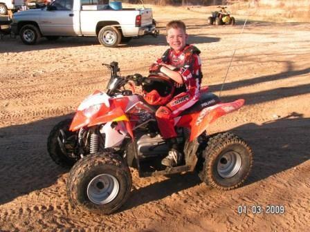 My son, Krew, on his new Polaris Outlaw 90 at Red River in Muenster, Texas.                                                                                                                             