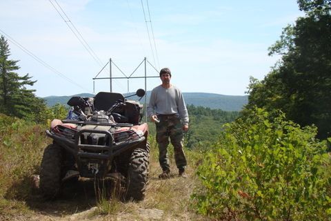 Troy at the top of the powerlines