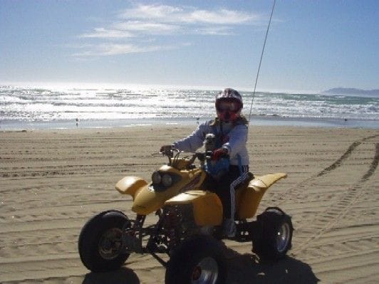 My Wife Trena giving the dog a ride on her honda 400ex down Pismo beach                                                                                                                                 