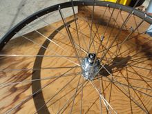 The last nine spokes being added from the drive side of the wheel. 