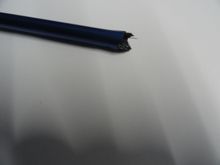 This is what damaged CF looks like.  Note the shards of carbon fibers sticking out from the damaged section.