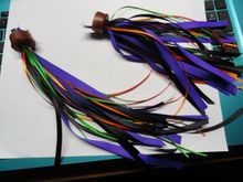 It took a bit of work but I managed to get the four color streamers into some bar plugs.