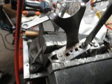 Toe clips come off and are set aside. Old screws are discarded and new Stainless button head screws will be installed.