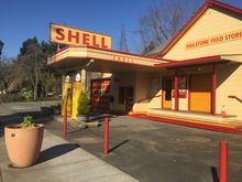 JcOld gas station, dry for decades - on Front St.