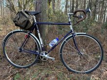 My favorite fixed-gear, now wearing 32mm Paselas and new 45mm SKS mudguards, with 22 years on the road this month.