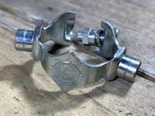 Simplex clamp with round mounts. 