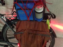 Elastic net secures lunch box. 