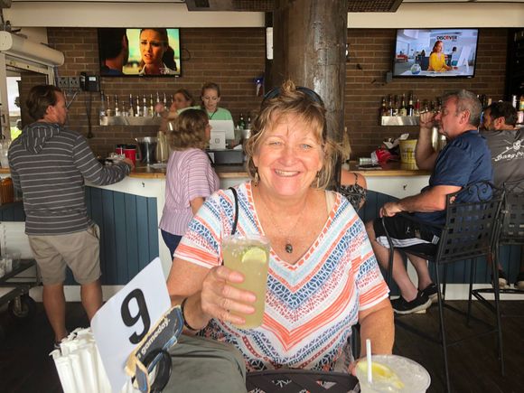 Celebrating at a sea side restaurant after the ride.