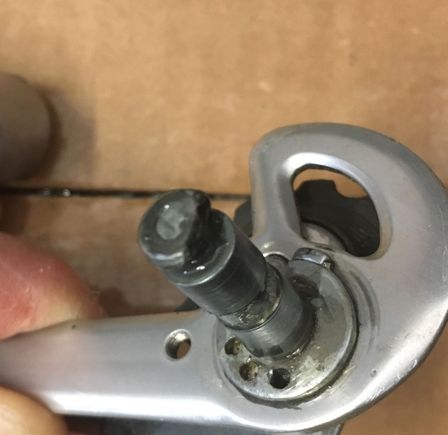 Post that holds the spring. Notice the circle with a flat, which is what holds the cage to the main body.