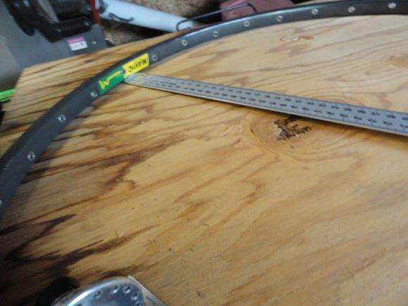 I use a metal ruler that measures in cm/mm.