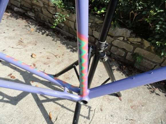 Exotic paint on down tube.