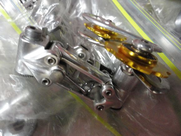 After refurbishing the part looks like new for the install.  I am thinking the yellow might blend in with the yellow bits on the frame logo.
