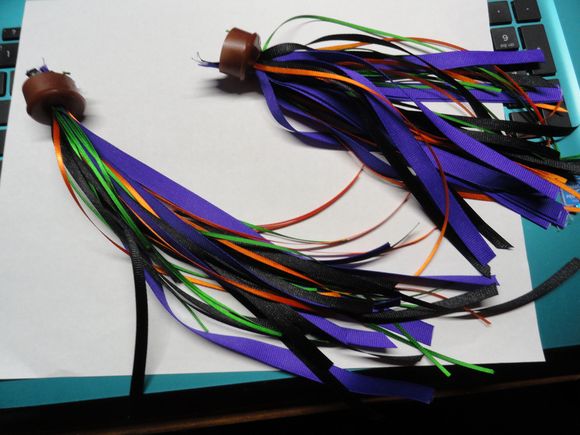 It took a bit of work but I managed to get the four color streamers into some bar plugs.