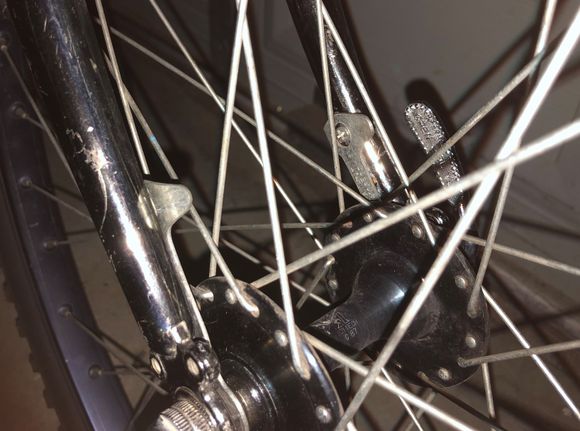 Clip snaps over a stub on the fork.