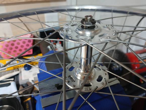 Rebuilt the Normandy hubs.  Whoever said -- despite the semi-permanent dust caps -- it's as easy as a magnet on the way out and tweezers on the way in ... I totally agree.