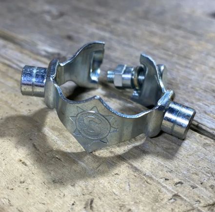 Simplex clamp with round mounts. 