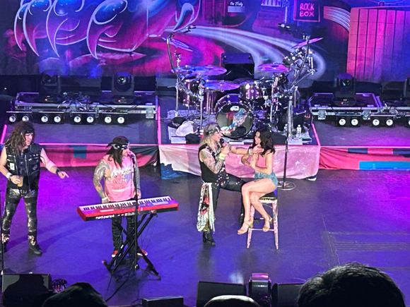 Good looking girl fan invited on stage