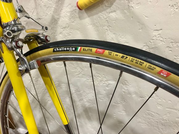 I only ride tubies and have found the Challenge Elite Pro to be well made and durable. Going with a 27mm wide on this build, in case I take it to Eroica...