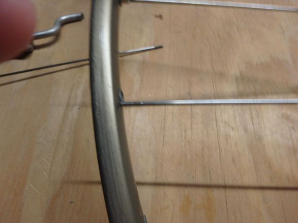 All of the preparation work of measuring and calculation has created a soke length that goes just to the rim at the spoke hole.