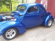 american racing wheels, its neighbors car. he likes so not my call. but yes, still sanding between the louvers of side panels. very tedious work as they are original