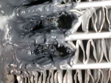 I did the repair woth the radiator in place. If I had had the time to do it properly, I would have removed it.

