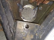Hole saw wouldn't touch it but the angle grinder ate it up.
