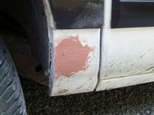 Fixings a hole, driver side fender.