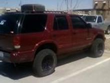 blazer with 3in bl and 31s on 15x8s rockcrawler rims.
