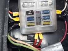 Ran from auxiliary fuse panel in center console.  Its 2 12 awg ran in series 