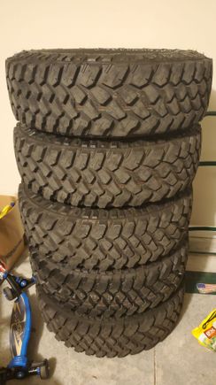 Picked up a set of 5 of brand new 255x75r17 Firestone MT2s mounted on Jeep wheels for $500. I ordered some customs wheel adapters to change the lug pattern but also to be hub and wheel centric.