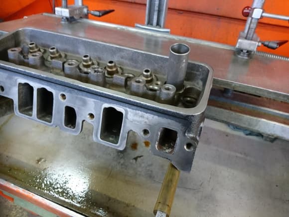 The rocker stud bosses have been machined and tapped for screw-in studs. These heads are the same as for the TPFI the little dome on top of the runners is for the injectors spraying to the valves.