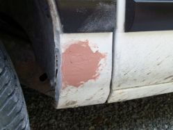 Fixings a hole, driver side fender.