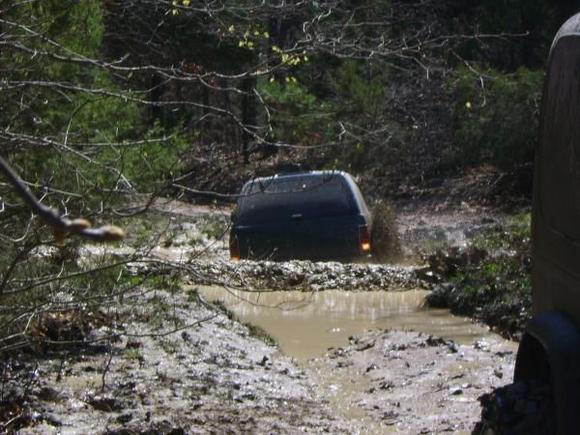 My oldest son's rig on one of our mudding/camping trips.