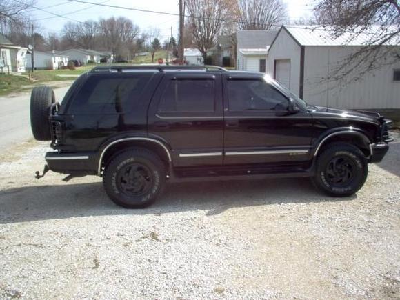 spring clean up. I painted the stock rims with semi-gloss rustoleum spray paint, and I also painted the grill also. I also added coil overload shocks on the rear to level it out.