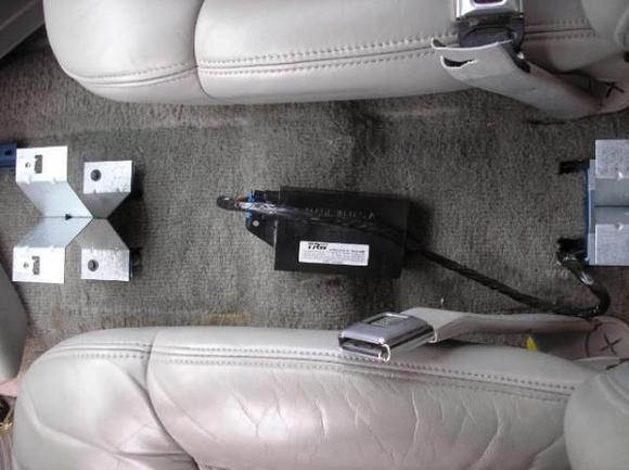 Keyless Entry Module with glue velcro strips attached to bottom of console
