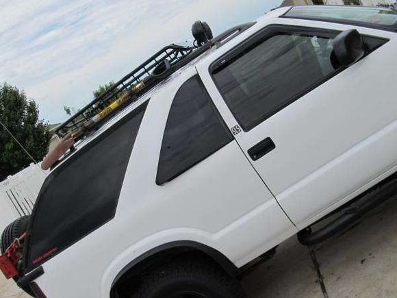 Replaced luggage rack with a longer one off of a 4 door
