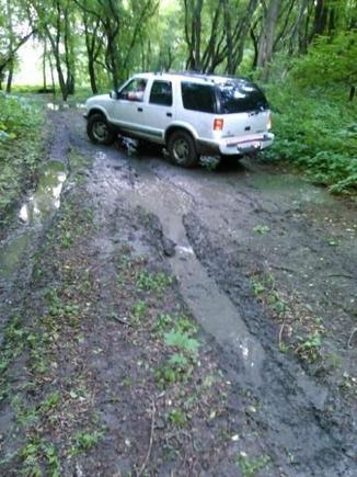 In front and finding the soupy clay is slick as oil. We got it though.