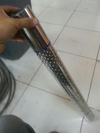 Drilling de holes for the inner part of the muffler