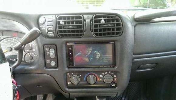 Double din Clarion VX401 with 03-up dash bezel and hand made steel mounting brackets and hand made rubber radio support bracket. Sorry no pics of the custom mounting hardware.