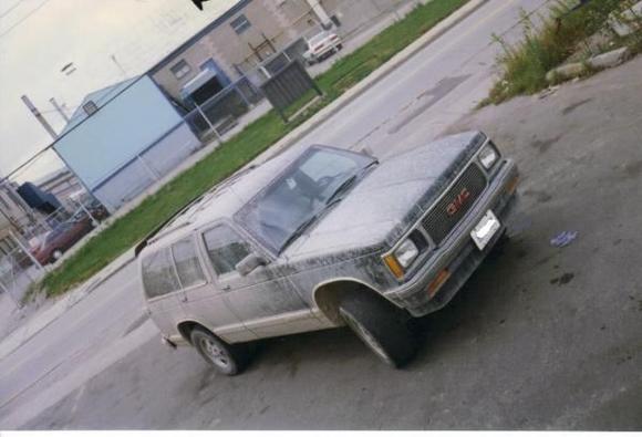 the first weekend i had it i went playing in the sand pit @ my Dad's work. hard to tell, but the truck is dark green.